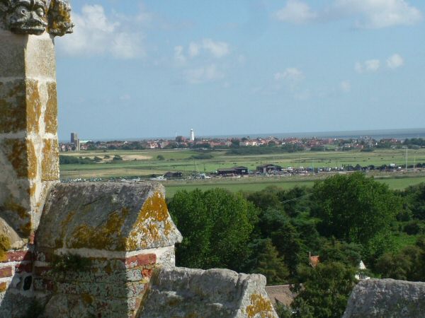 1: Looking North East across Southwold Harbour toward the town of Southwold. On the left is St Edmunds Church with the Catholic Church, on the Common, just in front. The famous lighthouse is clearly visible too. 
