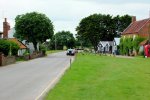 4: Looking East towards the Village Sign, and the sea through the trees beyond
